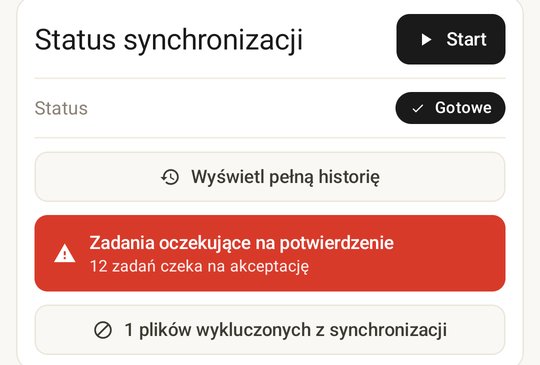 Sync Status card with the awaiting-confirmation alert: tasks have been parked for review instead of running automatically.